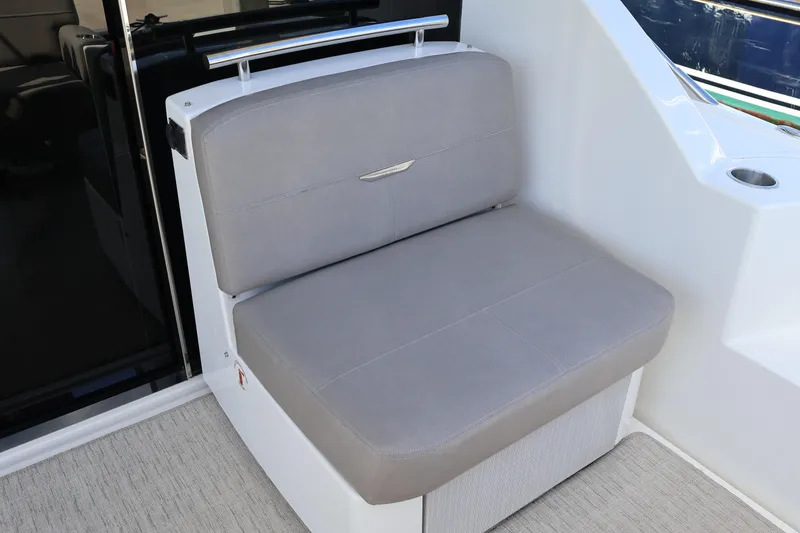 Slide: The Image of Gray seating area on 2020 Tiara Yachts C44 Coupe, featuring modern design and comfort. - 18