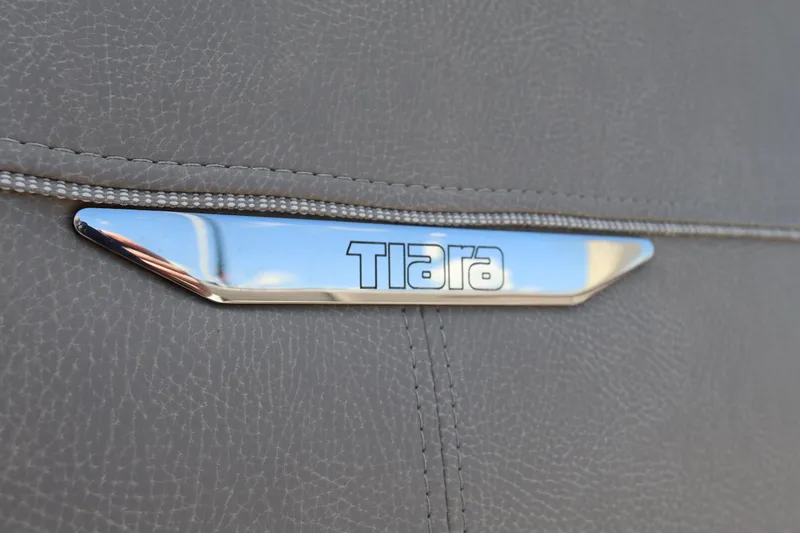 Slide: The Image of Chrome Tiara Yachts logo on 2020 C44 Coupe's leather interior. - 20