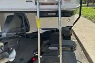 Slide: The Image of 2013 Chaparral Sunesta 224 boat with ladder and trailer hitch. - 19