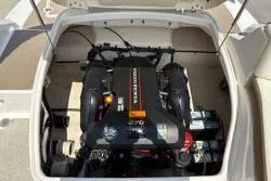 Slide: The Image of 2013 Chaparral Sunesta 224 engine compartment showcasing powerful inboard motor. - 20