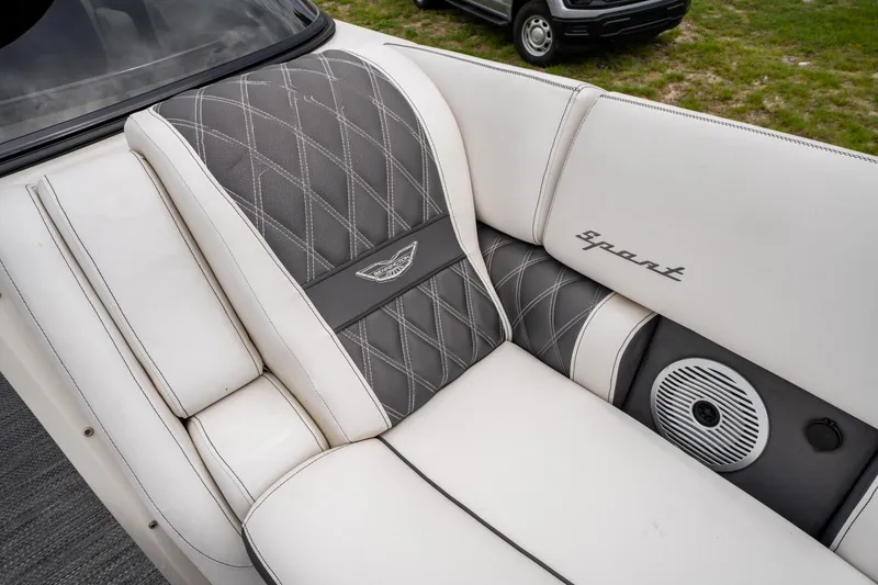 Slide: The Image of Luxurious seating on 2021 Bennington R25 Sport boat with elegant stitching and integrated speaker. - 14
