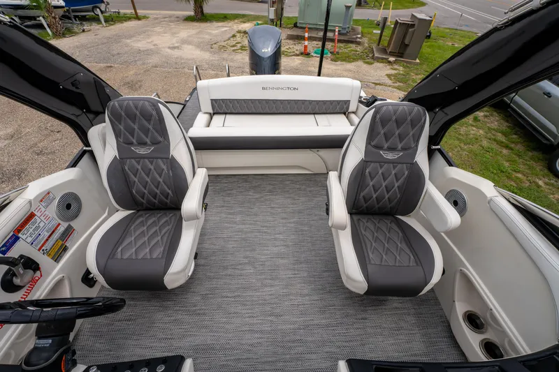 Slide: The Image of 2021 Bennington R25 Sport boat interior with luxurious seating and modern design. - 18