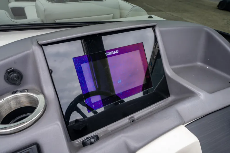 Slide: The Image of Simrad display on 2021 Bennington R25 Sport boat dashboard. - 27