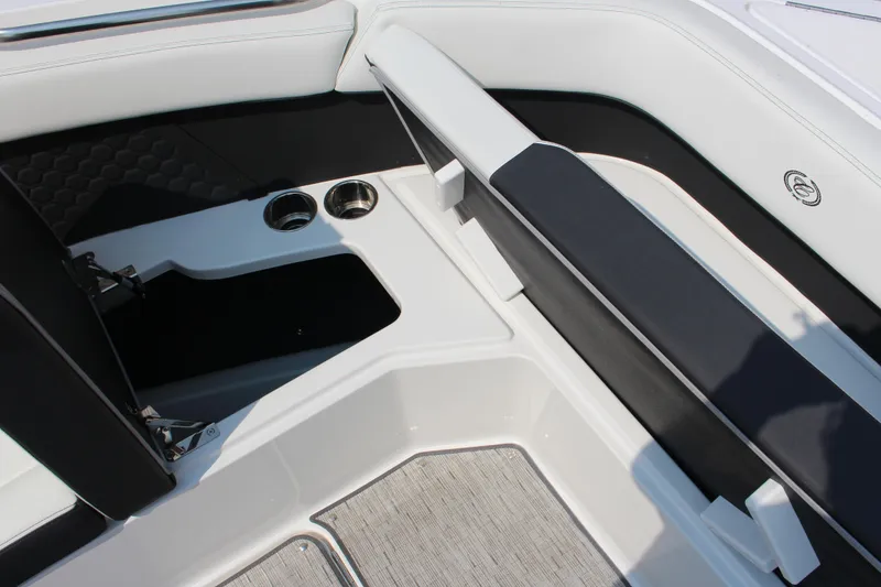Slide: The Image of 2025 Cobalt R8 Surf boat interior with sleek seating and cup holders. - 17