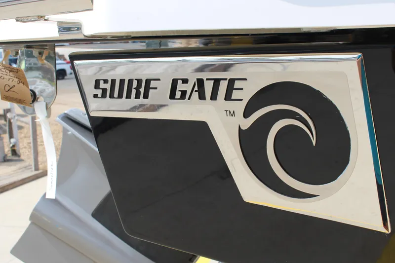 Slide: The Image of 2025 Cobalt R8 Surf boat with Surf Gate technology, featuring sleek design elements. - 28