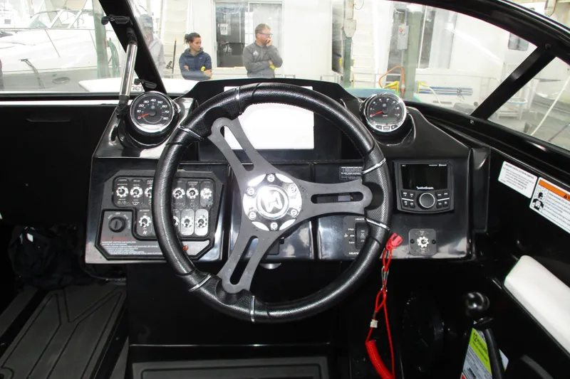 Slide: The Image of 2023 Heyday WT-2DC boat dashboard with steering wheel and control panel. - 7