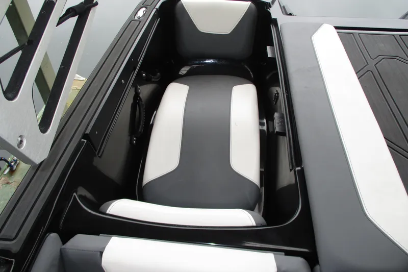 Slide: The Image of 2023 Heyday WT-2DC boat interior seating with black and white upholstery. - 12