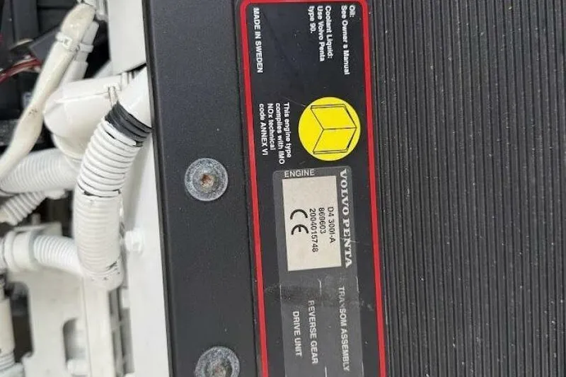 Slide: The Image of Volvo Penta engine label on a 2008 Dyer 29 boat, showing specifications and certifications. - 7