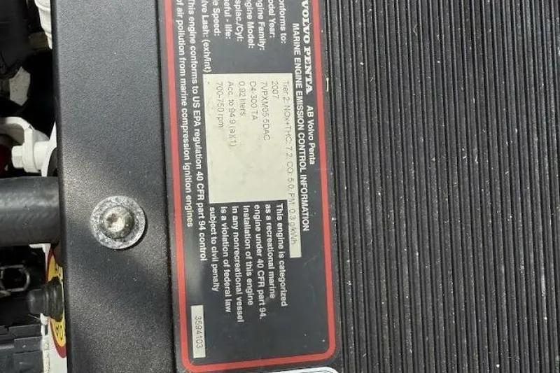 Slide: The Image of Close-up of Volvo Penta marine engine emission control label on a 2008 Dyer 29. - 8