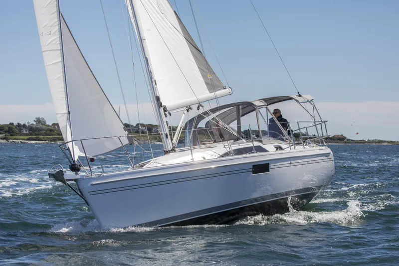 The Image of 2026 Catalina 316 sailboat navigating on open water under clear skies. - 0