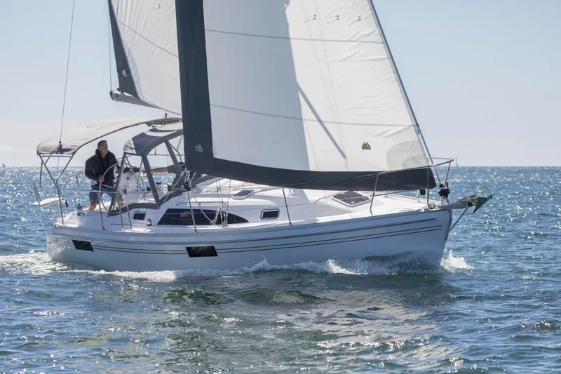 Slide: The Image of Sailing on a 2026 Catalina 316 yacht in open waters. - 13