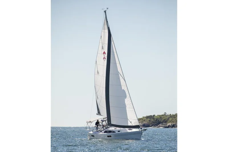 Slide: The Image of Sailing yacht Catalina 316, 2026 model, cruising on open water under clear skies. - 6