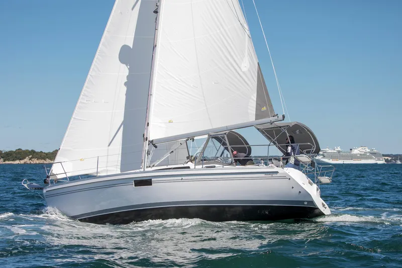 Slide: The Image of Sailing yacht Catalina 316, 2026 model, cruising on open water with clear skies. - 7