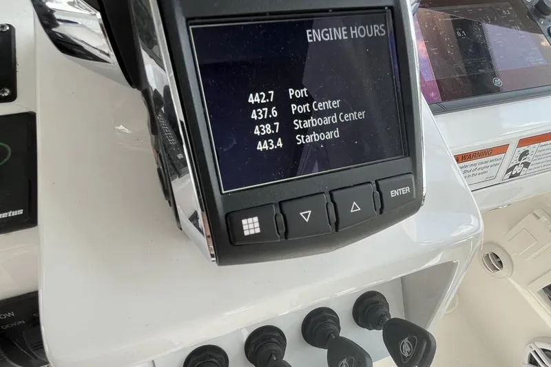 Slide: The Image of 2023 Intrepid 477 Evolution engine hours display on control panel. - 19