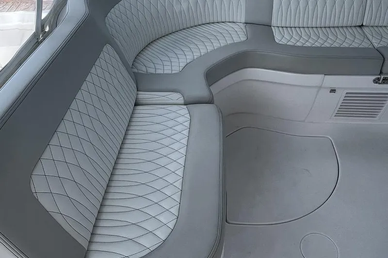 Slide: The Image of Luxurious seating on 2023 Intrepid 477 Evolution boat with diamond-stitched upholstery. - 30