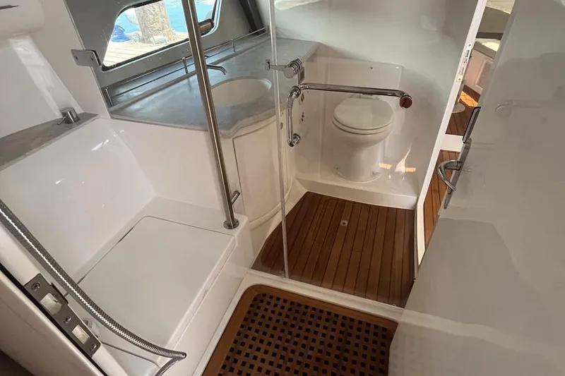 Slide: The Image of Luxurious bathroom interior of 2023 Intrepid 477 Evolution yacht with modern fixtures. - 53