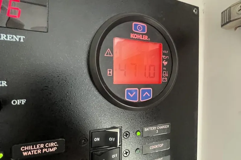 Slide: The Image of Control panel of 2023 Intrepid 477 Evolution with Kohler display showing 47.1 volts. - 65