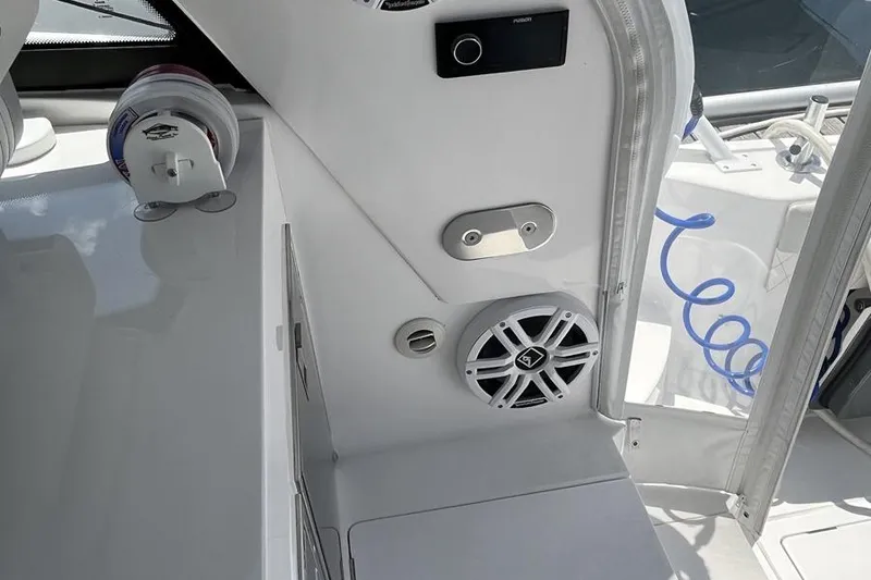 Slide: The Image of 2023 Intrepid 477 Evolution boat interior with speaker and control panel. - 69