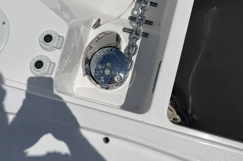 Slide: The Image of 2023 Intrepid 477 Evolution boat anchor chain and winch system detail. - 73
