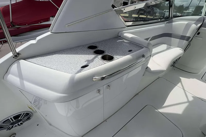 Slide: The Image of 2004 Formula 2800 BR boat interior with seating and cup holders. - 17