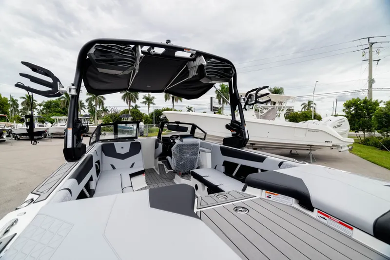 Slide: The Image of 2026 Nautique Super Air Nautique GS22 boat interior with sleek design and modern features. - 16