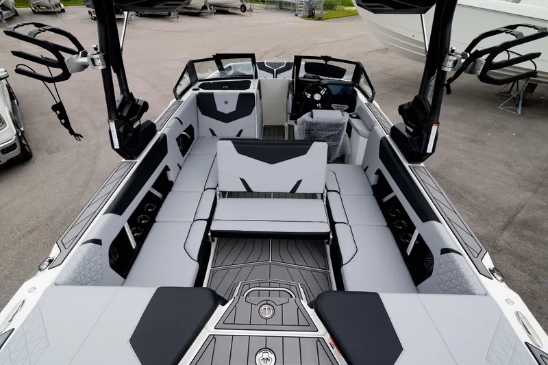 Slide: The Image of 2026 Nautique Super Air Nautique GS22 interior with sleek seating and modern design. - 2