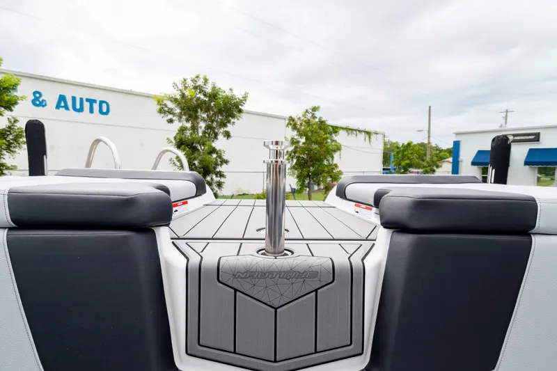 Slide: The Image of 2026 Nautique Super Air Nautique GS22 boat interior, featuring sleek seating and modern design. - 22