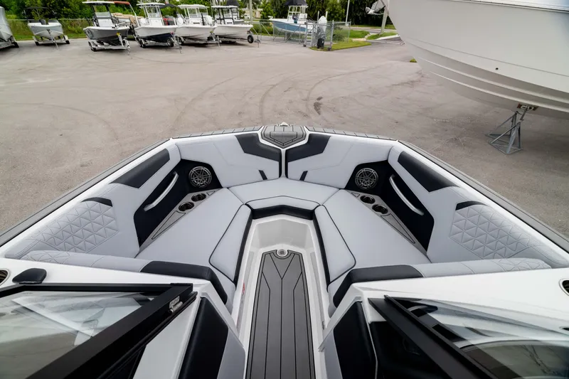 Slide: The Image of 2026 Nautique Super Air Nautique GS22 boat interior with luxurious seating and modern design. - 3