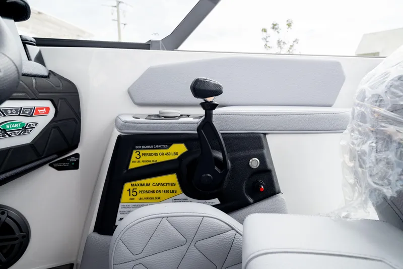 Slide: The Image of Interior of 2026 Nautique Super Air Nautique GS22 boat, showing control panel and seating. - 45