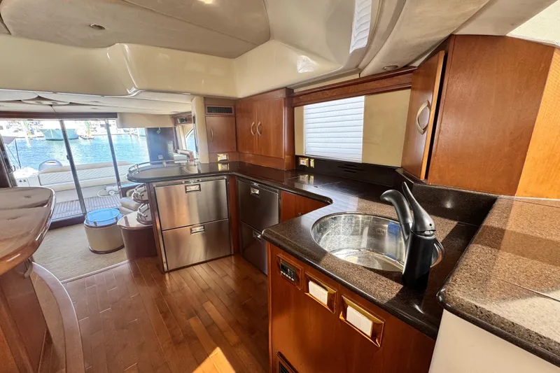 Slide: The Image of Luxurious 2009 Ovation 52 yacht kitchen with modern appliances and waterfront view. - 28