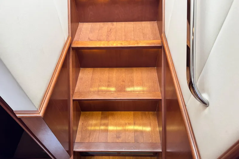 Slide: The Image of Wooden staircase with handrail inside 2009 Ovation 52 yacht. - 32