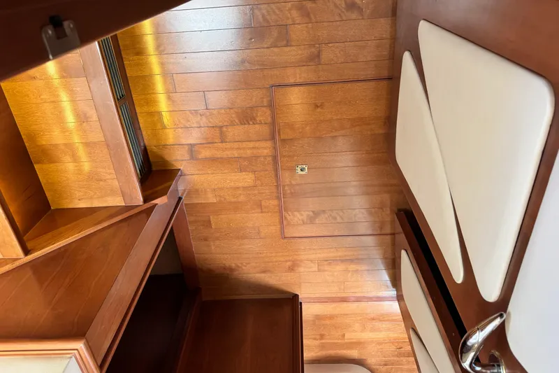 Slide: The Image of Luxurious wooden interior of 2009 Ovation 52 yacht, featuring elegant design and craftsmanship. - 33