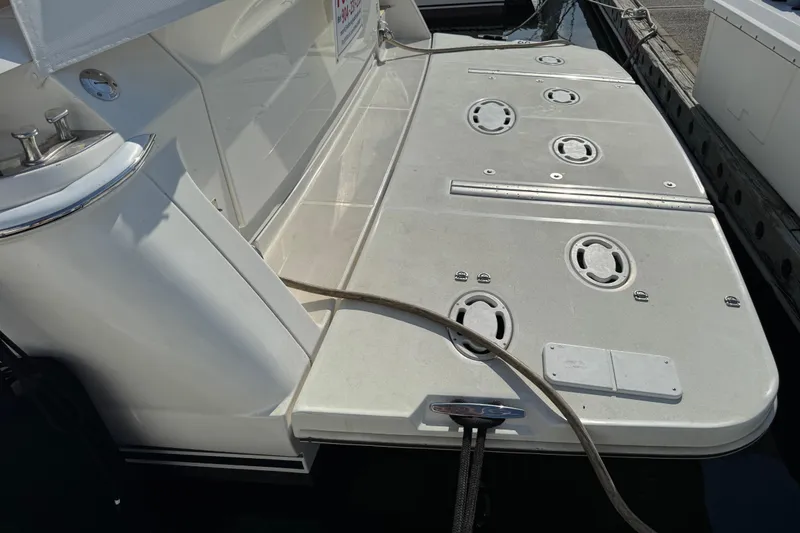 Slide: The Image of Stern view of 2009 Ovation 52 yacht with swim platform and mooring line. - 4