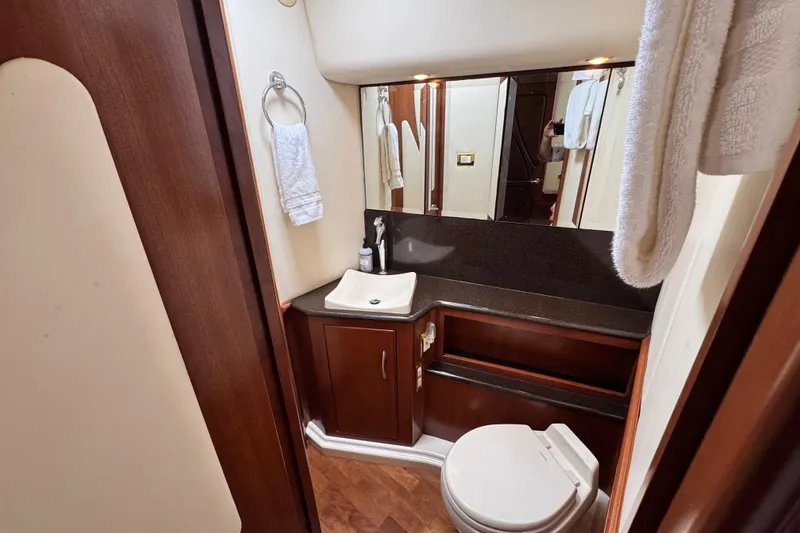 Slide: The Image of Luxurious 2009 Ovation 52 yacht bathroom with wood accents and modern fixtures. - 45