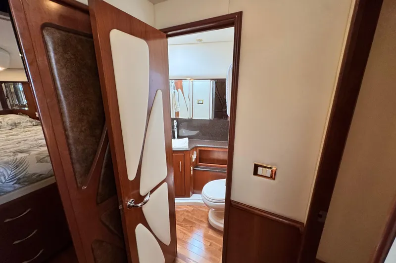 Slide: The Image of Luxurious 2009 Ovation 52 yacht interior with elegant bathroom and bedroom view. - 46