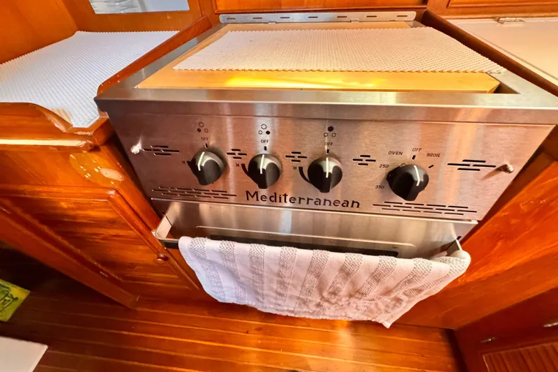 Slide: The Image of Stainless steel Mediterranean stove in 1982 Kelly Peterson 46 yacht kitchen. - 14