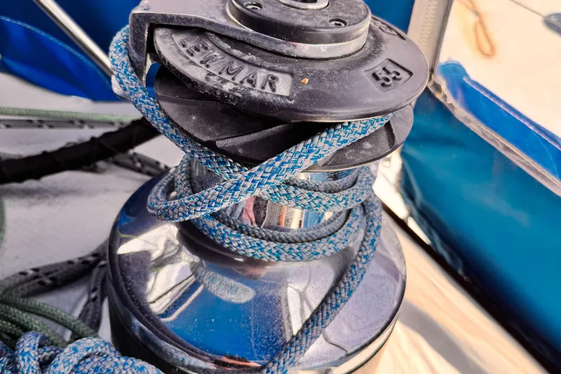 Slide: The Image of Winch with blue rope on 1982 Kelly Peterson 46 sailboat. - 31