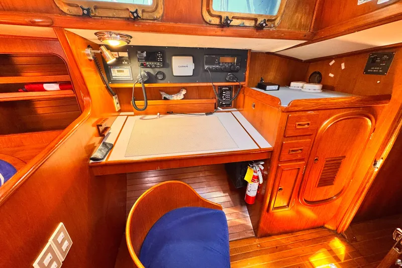 Slide: The Image of Nautical navigation station in 1982 Kelly Peterson 46 yacht with wooden interior and equipment. - 5