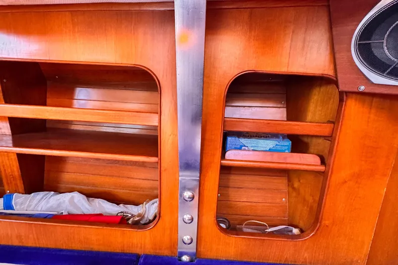 Slide: The Image of Wooden interior shelves on a 1982 Kelly Peterson 46 sailboat. - 8