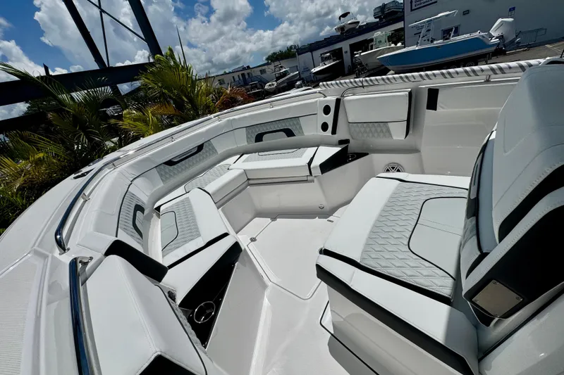 Slide: The Image of Luxurious seating on 2026 Blackfin 272 CC boat under a sunny sky. - 19