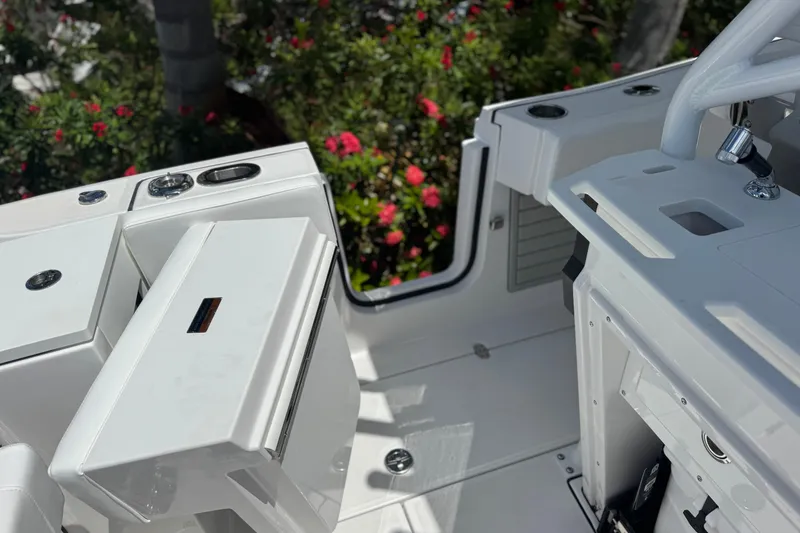 Slide: The Image of 2026 Blackfin 272 CC boat interior with sleek white design and modern features. - 35