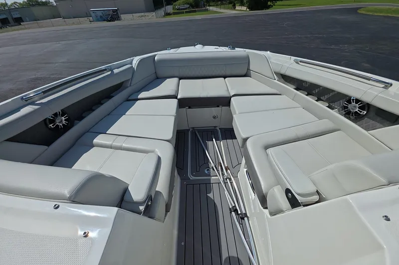 Slide: The Image of Luxurious seating area on a 2020 Sea Ray SLX 350 boat, featuring sleek design. - 15