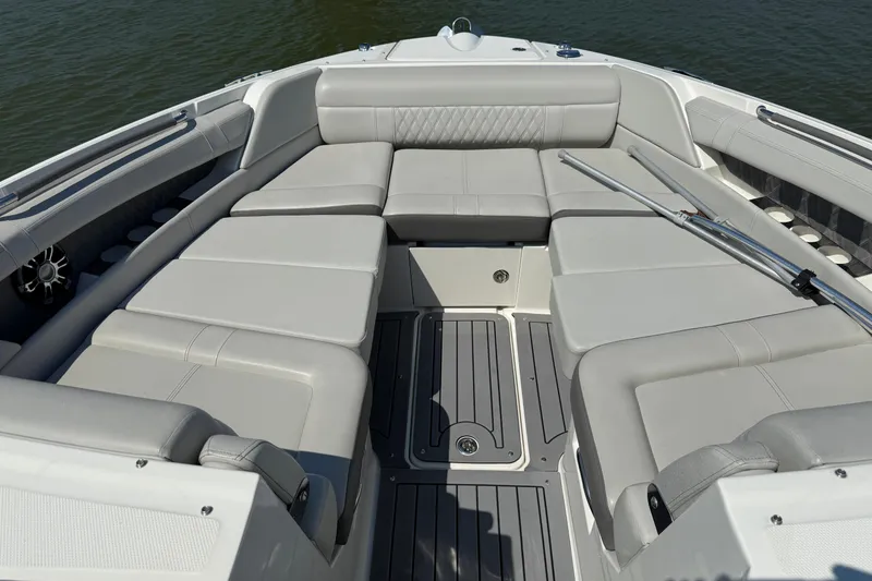 Slide: The Image of 2020 Sea Ray SLX 350 boat interior with spacious seating and sleek design. - 23
