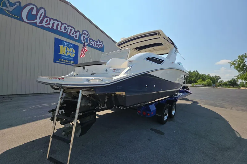 Slide: The Image of 2020 Sea Ray SLX 350 boat on trailer at Clemons Boats dealership. - 7