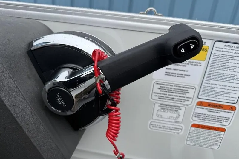 Slide: The Image of Throttle control of 2026 Sun Tracker Party Barge 22 DLX with safety lanyard. - 14