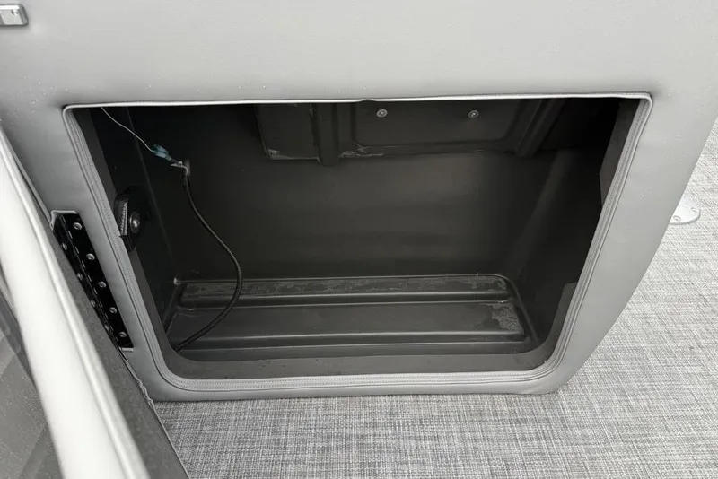 Slide: The Image of Storage compartment of 2026 Sun Tracker Party Barge 22 DLX pontoon boat. - 17