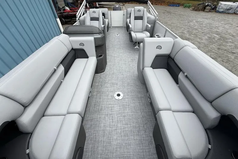 Slide: The Image of 2026 Sun Tracker Party Barge 22 DLX interior with spacious seating and modern design. - 25