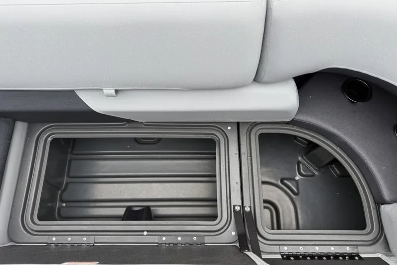 Slide: The Image of 2026 Sun Tracker Party Barge 22 DLX storage compartments, showcasing spacious and organized design. - 8