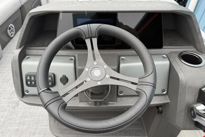 Slide: The Image of Steering wheel of 2026 Sun Tracker Party Barge 22 DLX pontoon boat. - 9