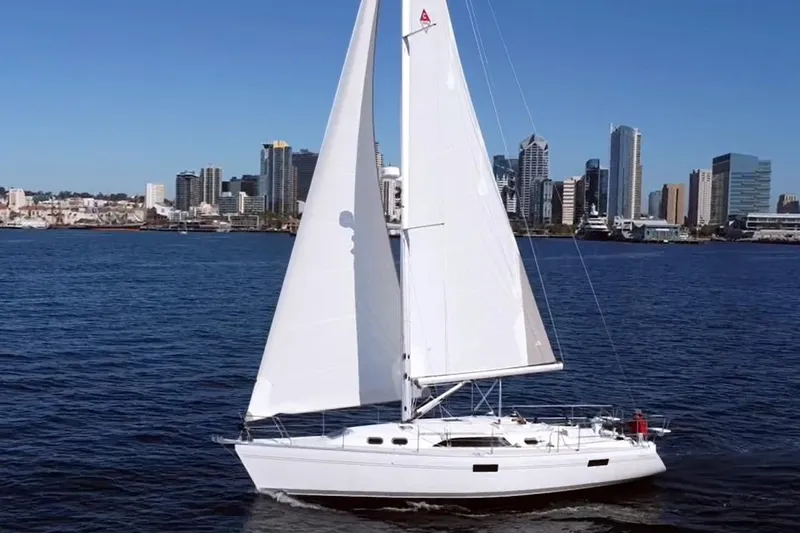The Image of Sailboat Catalina 386 (2026) cruising near city skyline on a sunny day. - 0